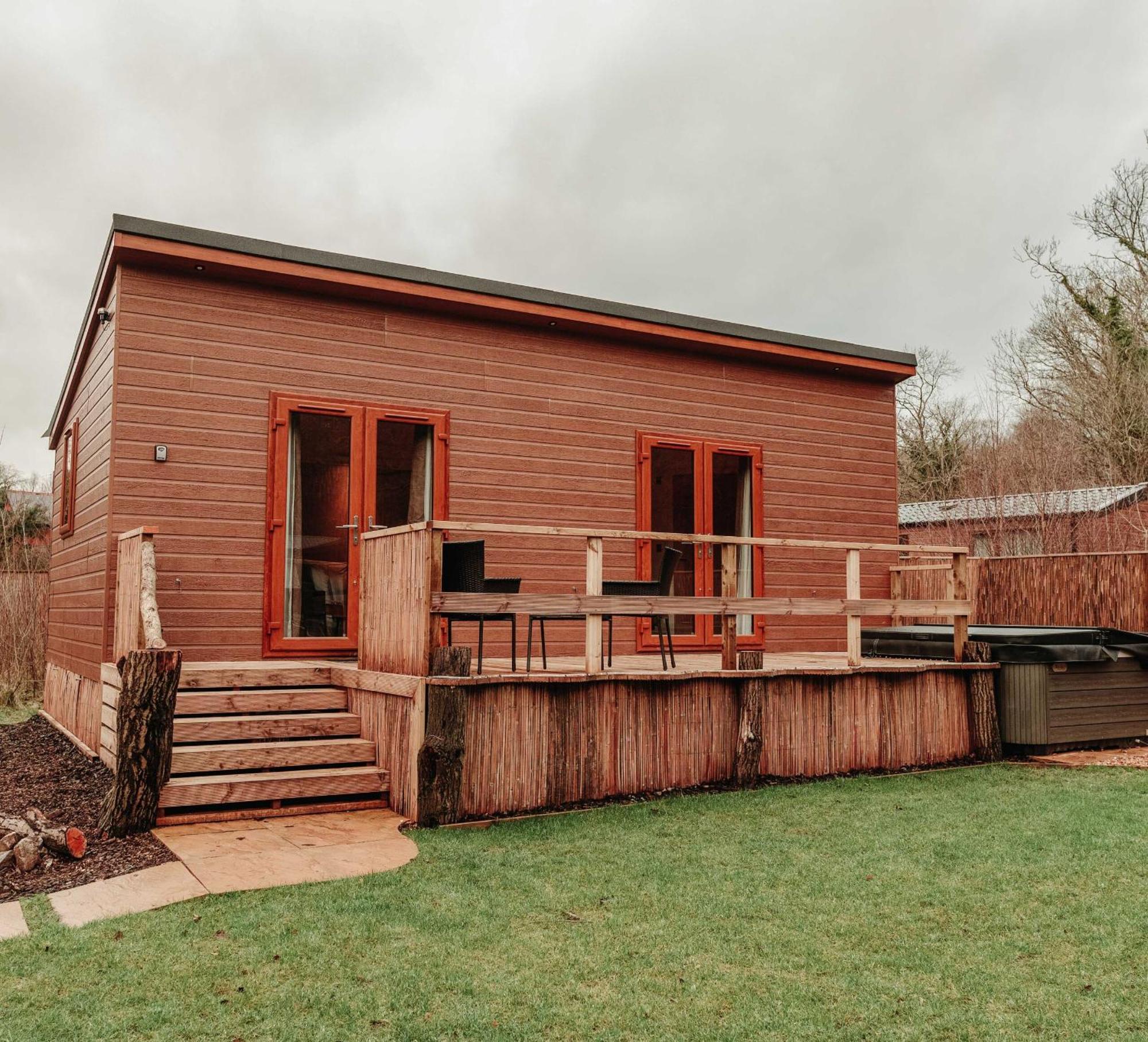 Herons Lake Retreat Hot Tub Lodges Caerwys Exteriör bild
