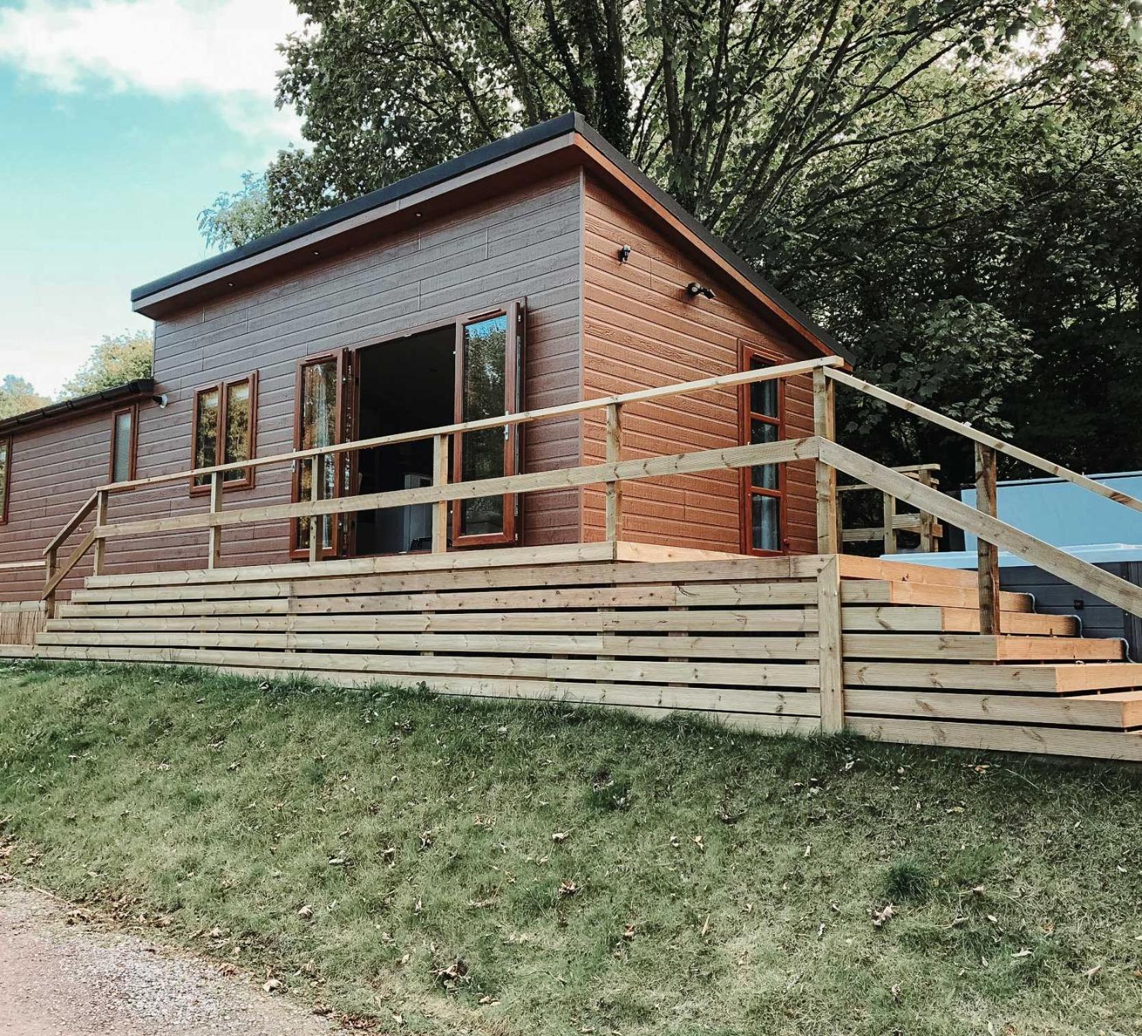 Herons Lake Retreat Hot Tub Lodges Caerwys Exteriör bild